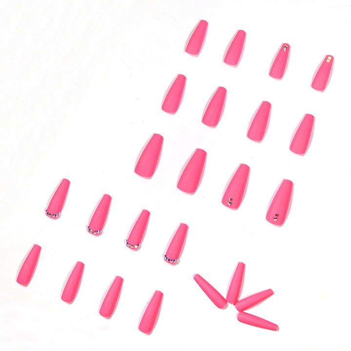Artificial nail set with matte finish and sparkling rhinestone embellishments Bowlift