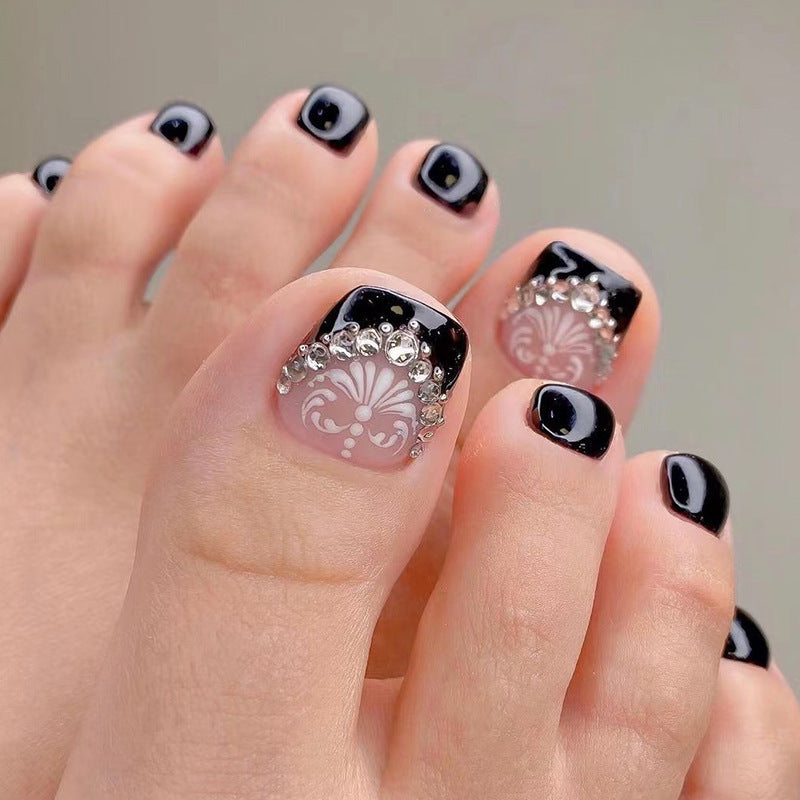 Artful toenail art with elegant glitter accent Bowlift