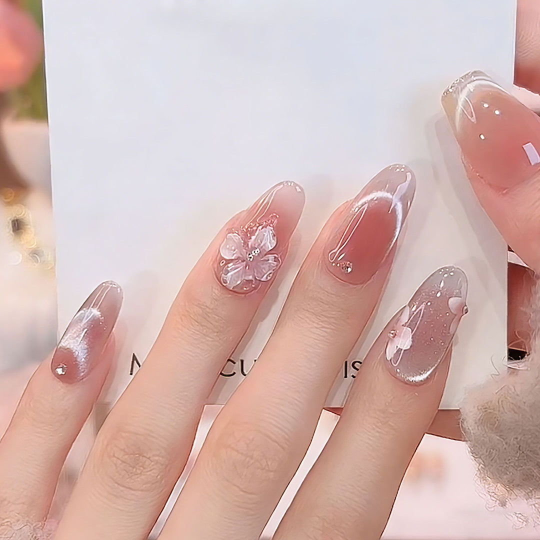 Artificial nail set with festive gift design and elegant glitter accents Bowlift