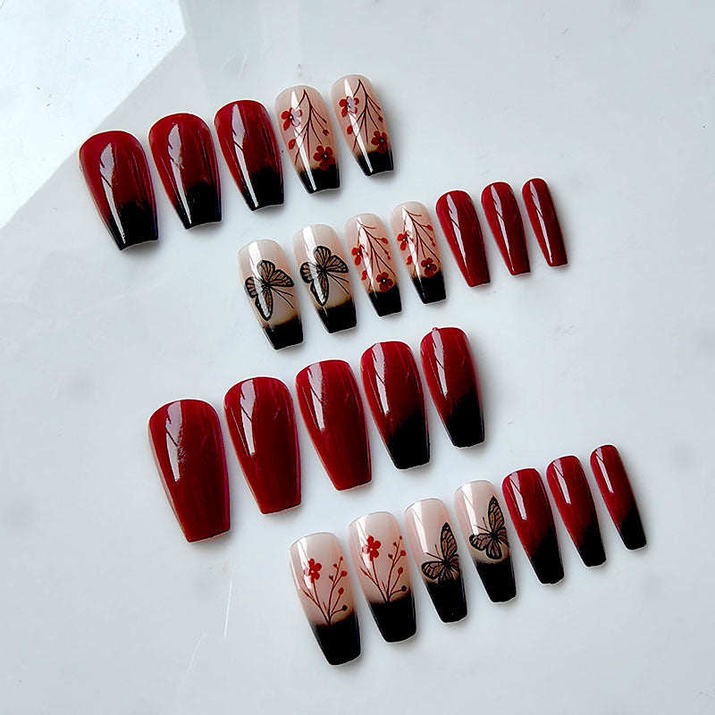 Artificial nails with butterfly and flower motifs Bowlift