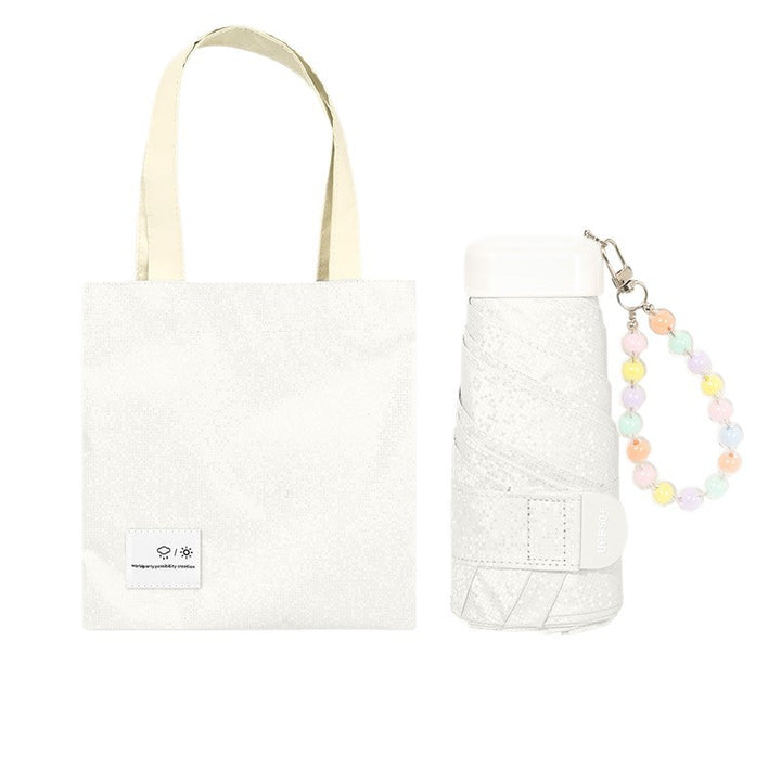 Women’s tote bag with integrated folding umbrella Bowlift
