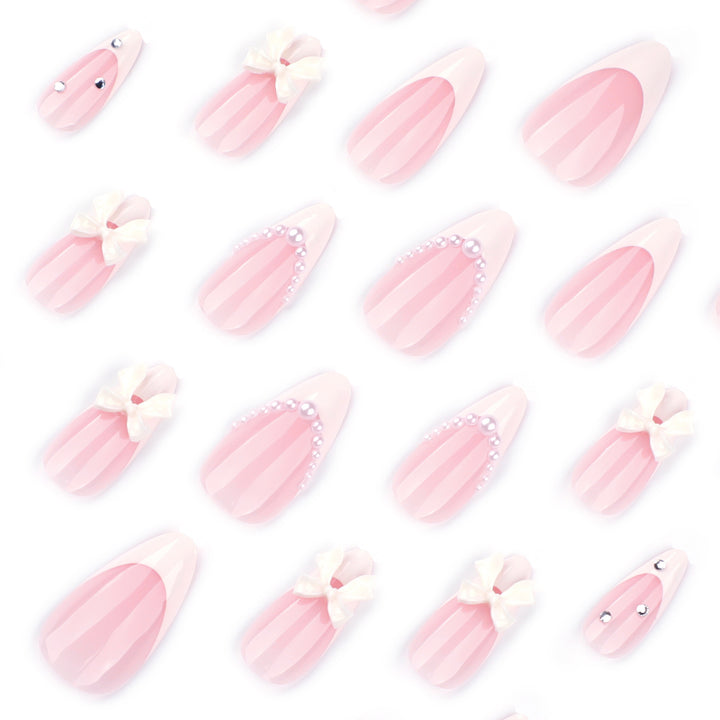 Artful stiletto nails with elegant flower embellishment Bowlift