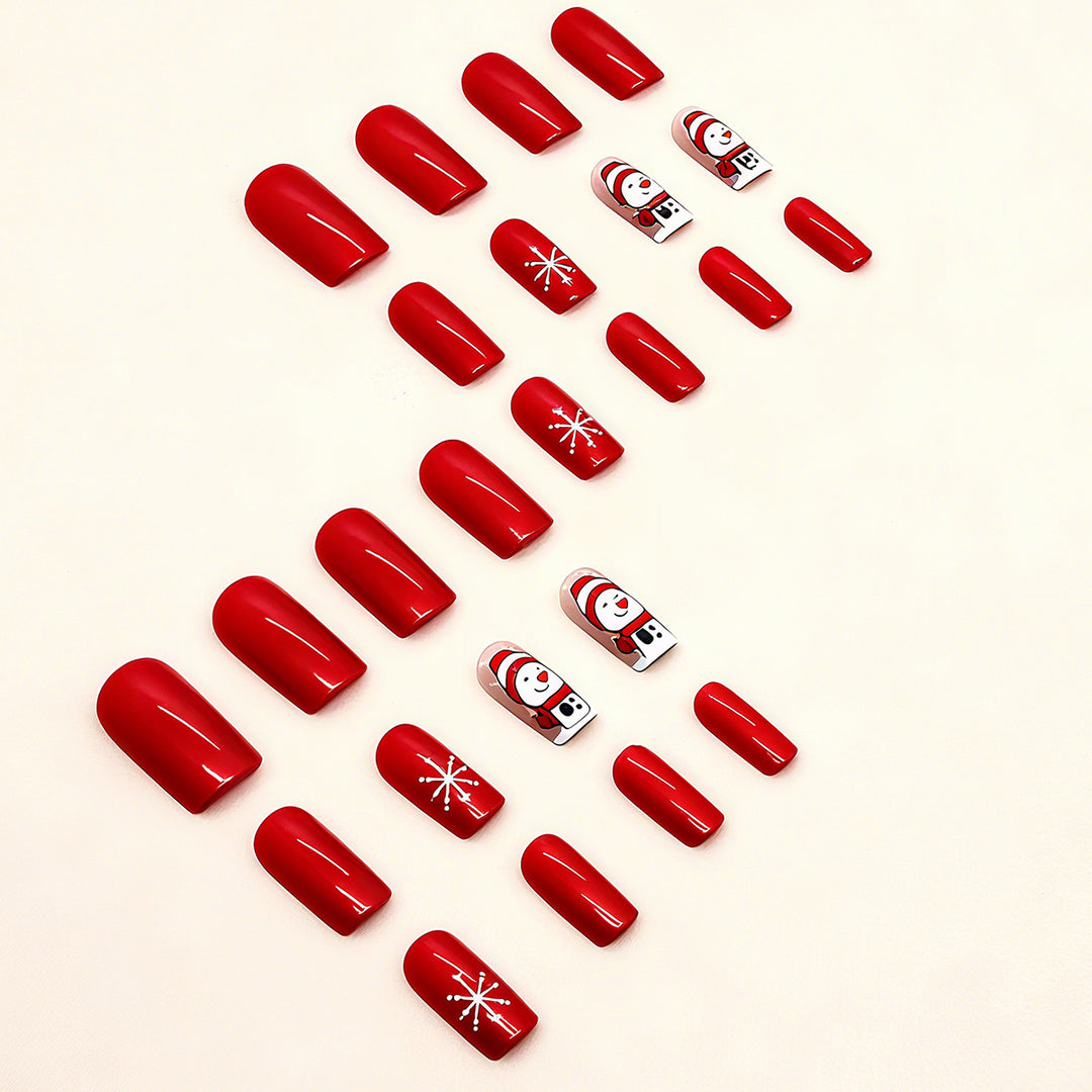 Artificial nail set with festive snowman design and glitter accents Bowlift