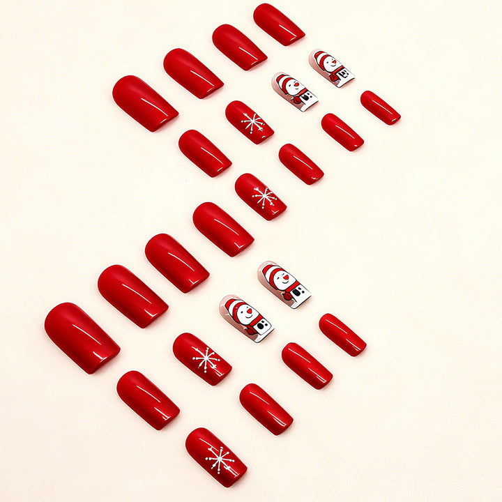 Artificial nail set with festive snowman design and glitter accents Bowlift