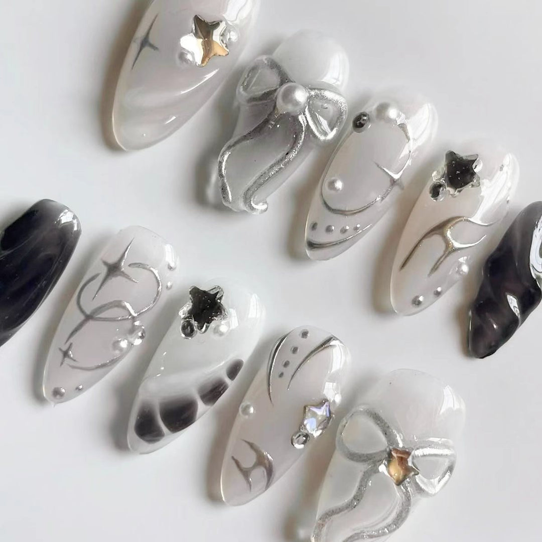 Creative Press-On Nail Art Set with Elegant Silver Accents Bowlift