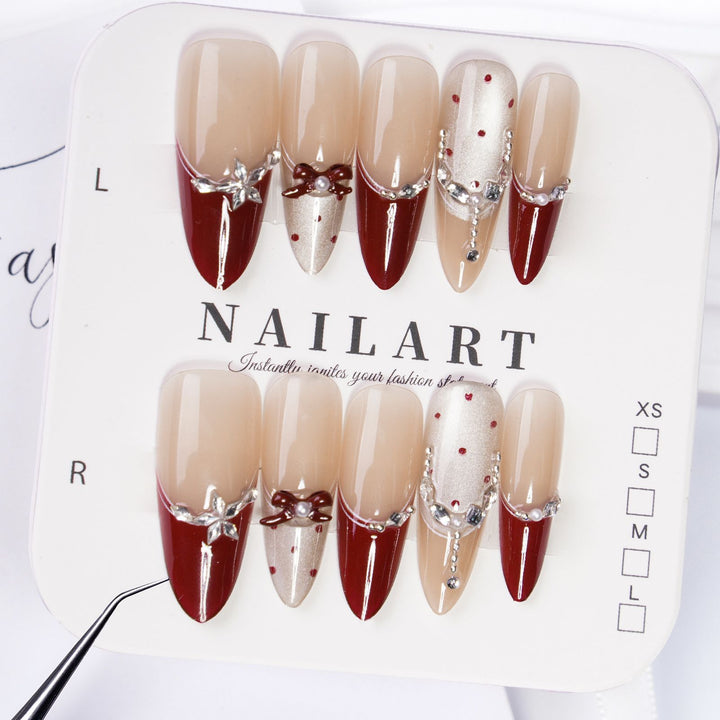 Artificial nails with glitter and tip accents Bowlift