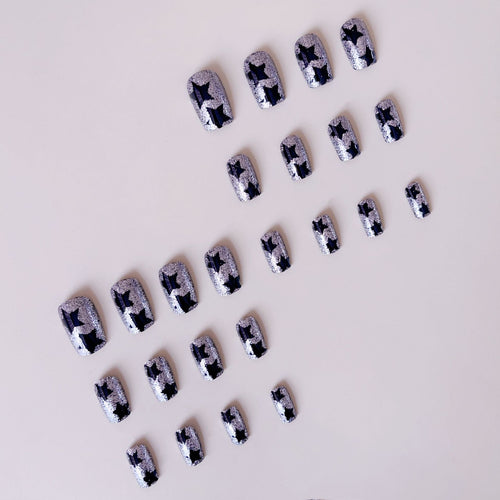Artificial nail set with glamorous rhinestone embellishments and star motifs Bowlift
