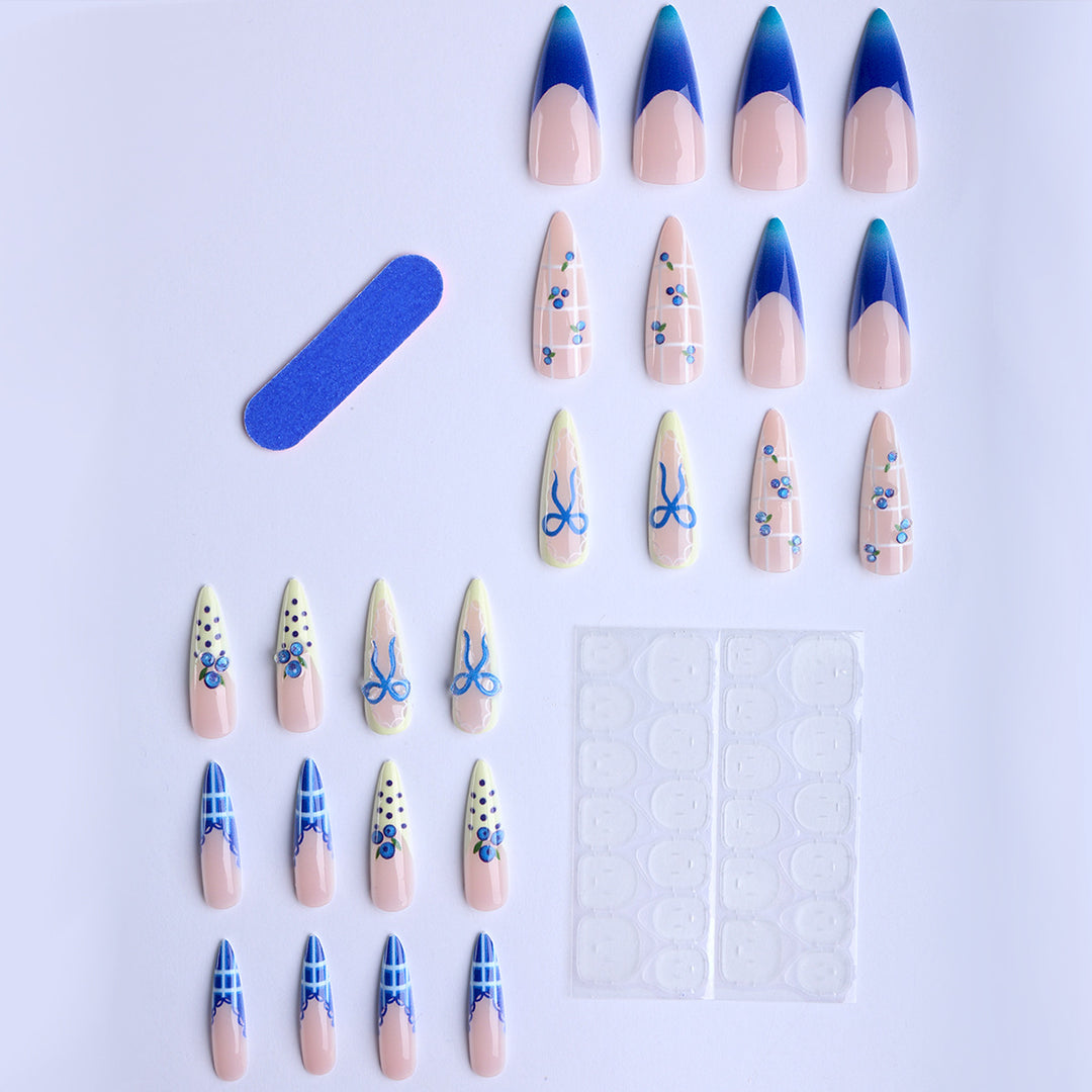 Artificial nails with playful design and elegant accents Bowlift