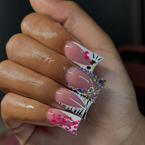 Artistic Nail Art with Animal Motif and Rhinestone Decorations Bowlift
