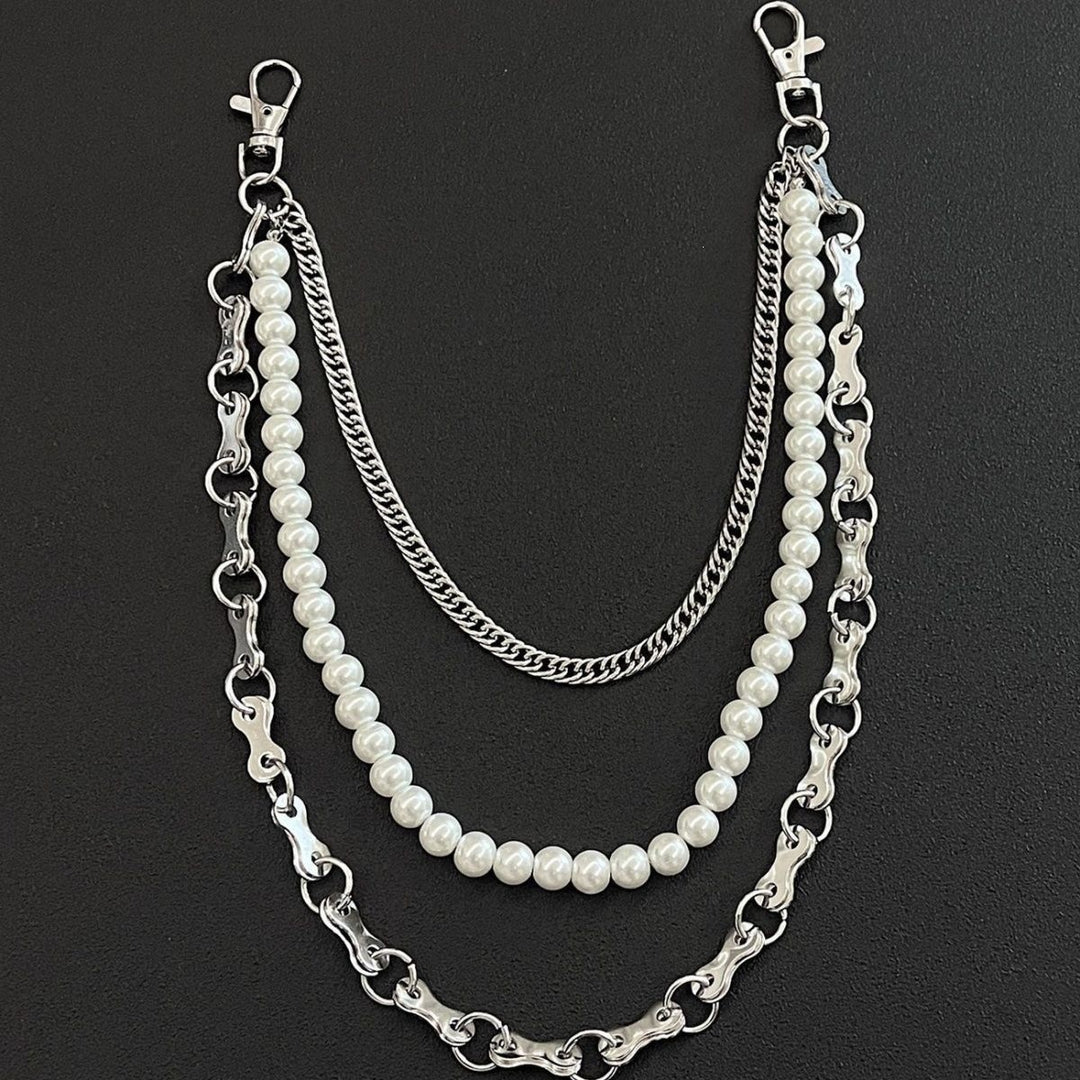 Fashionable chain bracelet with pearls and metal links Bowlift
