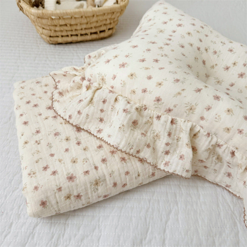 Unisex Muslin Blanket with delicate floral design and elegant ruffles Bowlift
