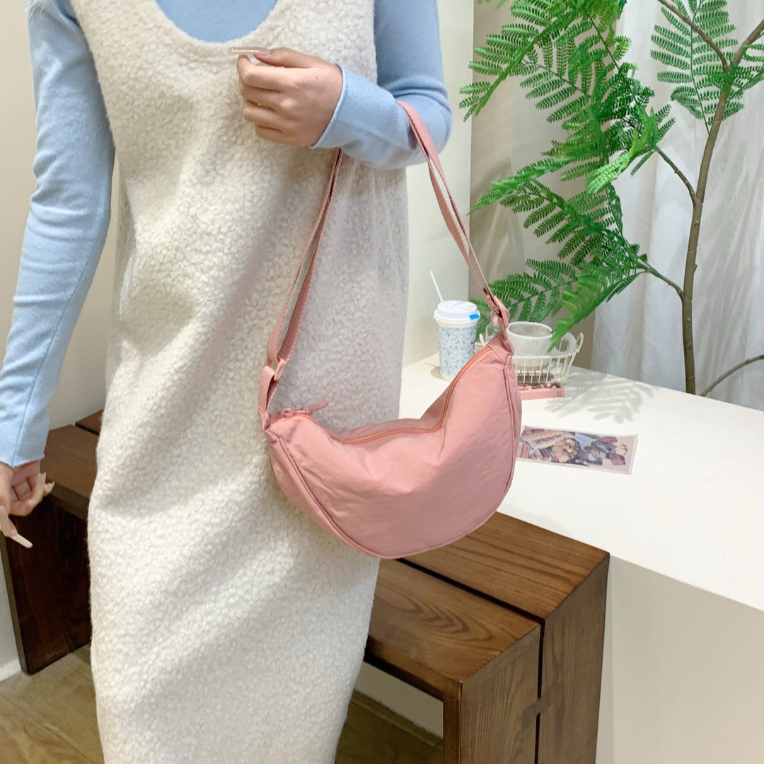 Shoulder bag with adjustable shoulder strap and practical compartments Bowlift