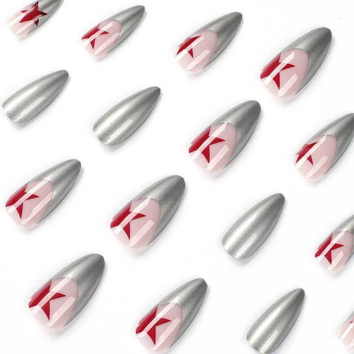 Artful stiletto nails with silver and star motifs Bowlift