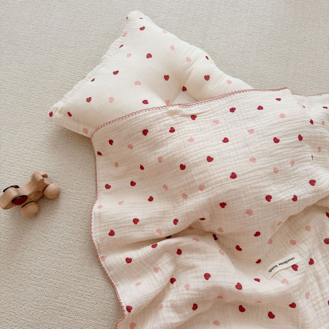Unisex Muslin Blanket with delicate floral design and elegant ruffles Bowlift