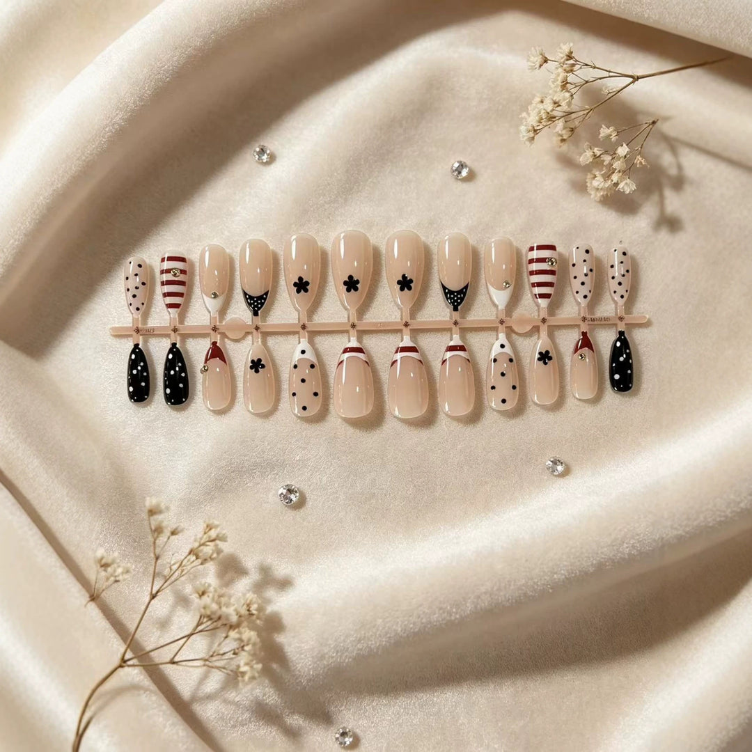 Artistic Stiletto Press-On Nail Set with Unique Patterns Bowlift