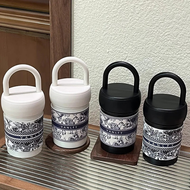 Women's stylish thermos cup with practical carrying handle Bowlift