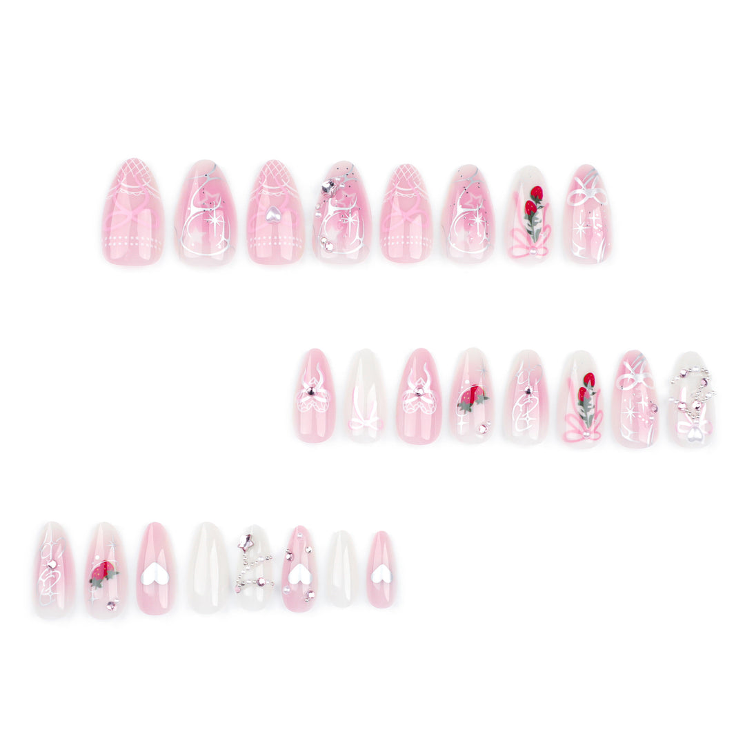 Artificial nail art with romantic design and glitter accents Bowlift