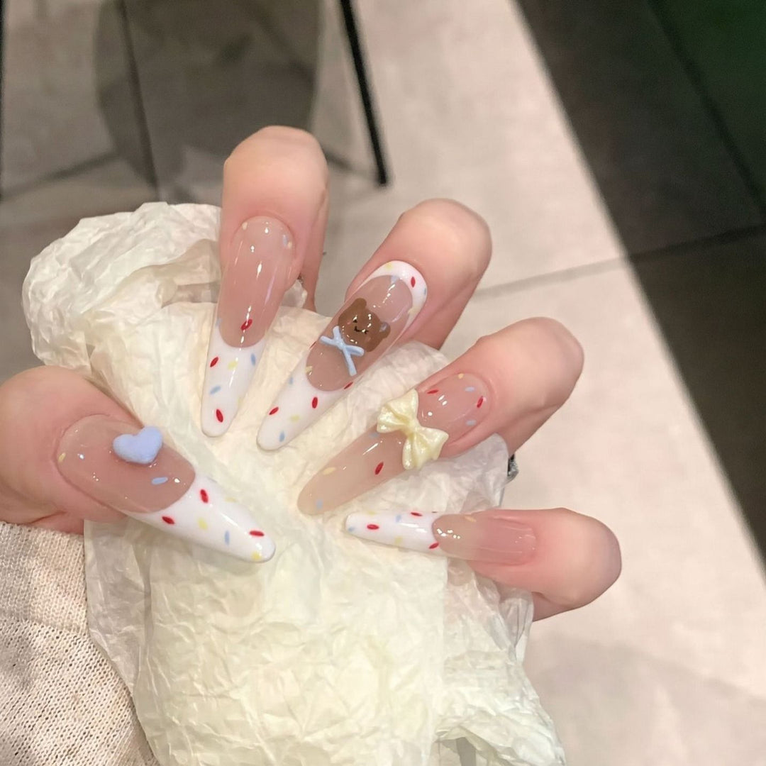 Artistic Stiletto Press-On Nail Set with Unique Design Elements Bowlift