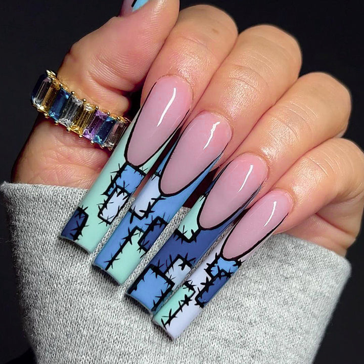 Artistic stiletto nails with modern decorative accents Bowlift