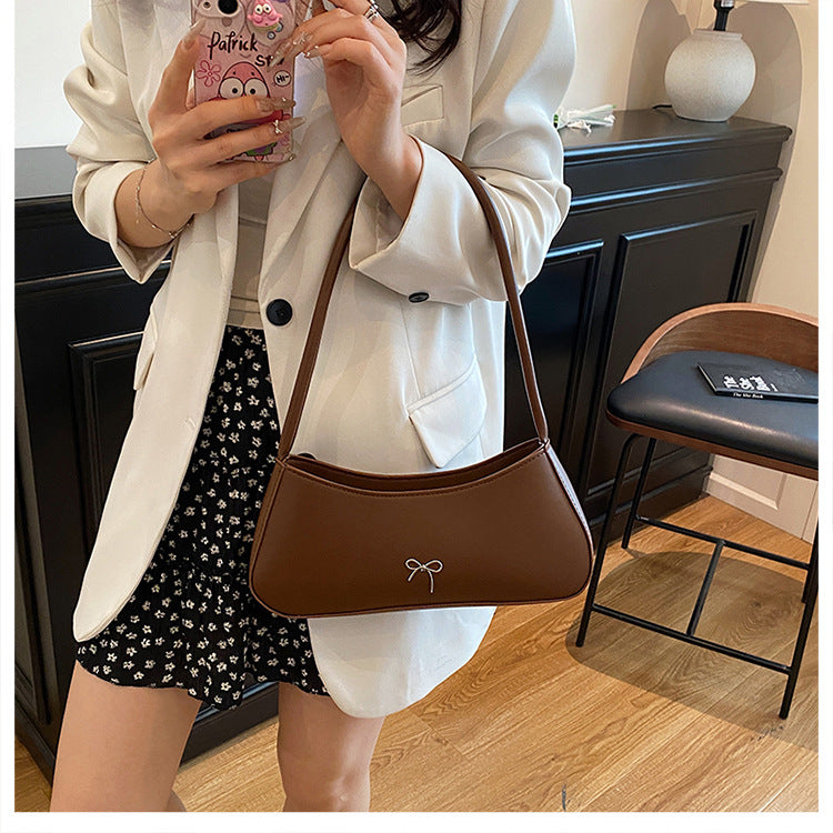 Elegant Curved Handbag Bowlift