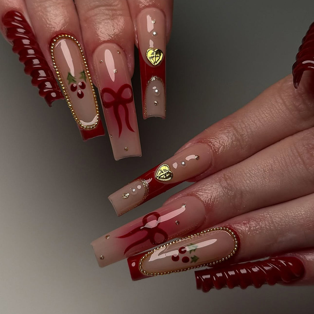 Artificial nail set with festive accents and glitter embellishments Bowlift