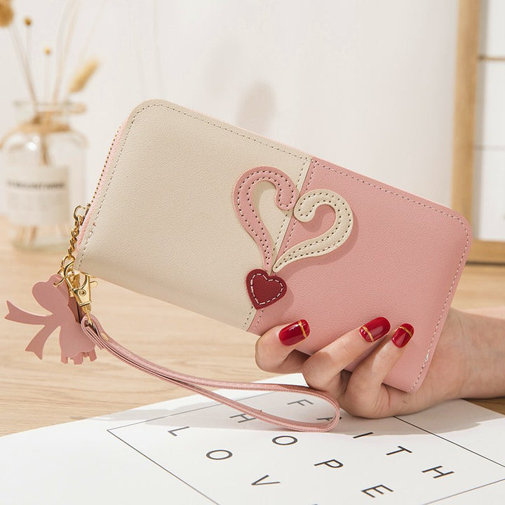 Stylish wallet with heart appliqués Bowlift