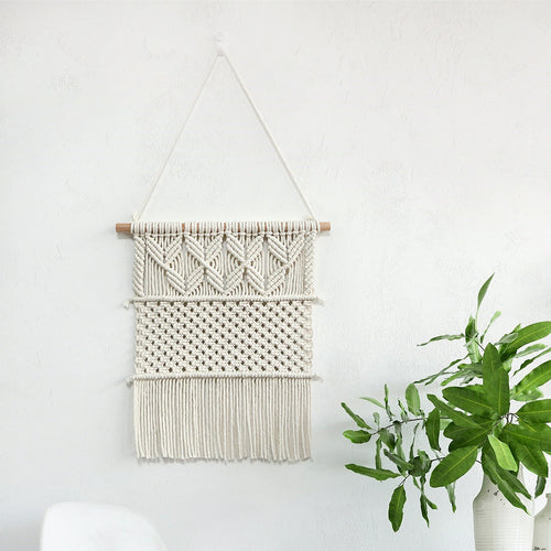 Handwoven macrame wall hanging in boho style