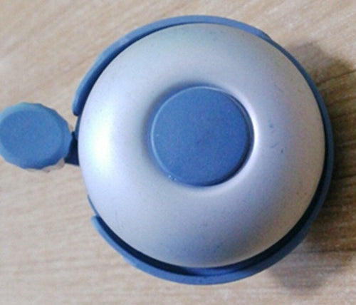 compact bicycle bell with quick-release handlebar mount Bowlift