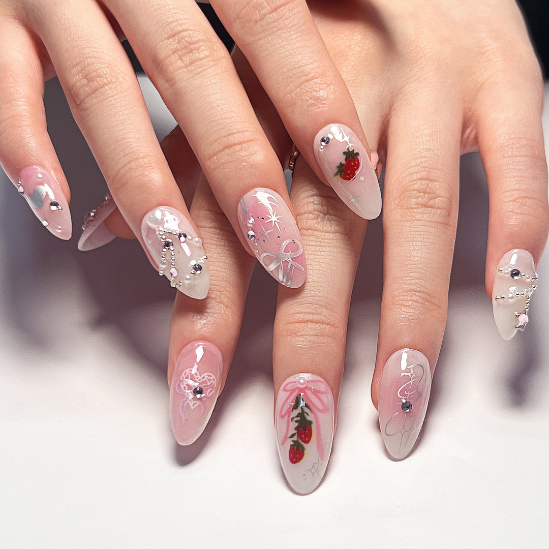 Artificial nail art with romantic design and glitter accents Bowlift