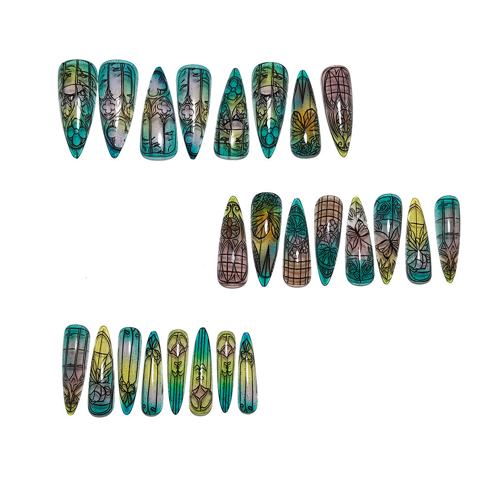 Artificial nails in elegant stiletto design with elaborate motifs Bowlift