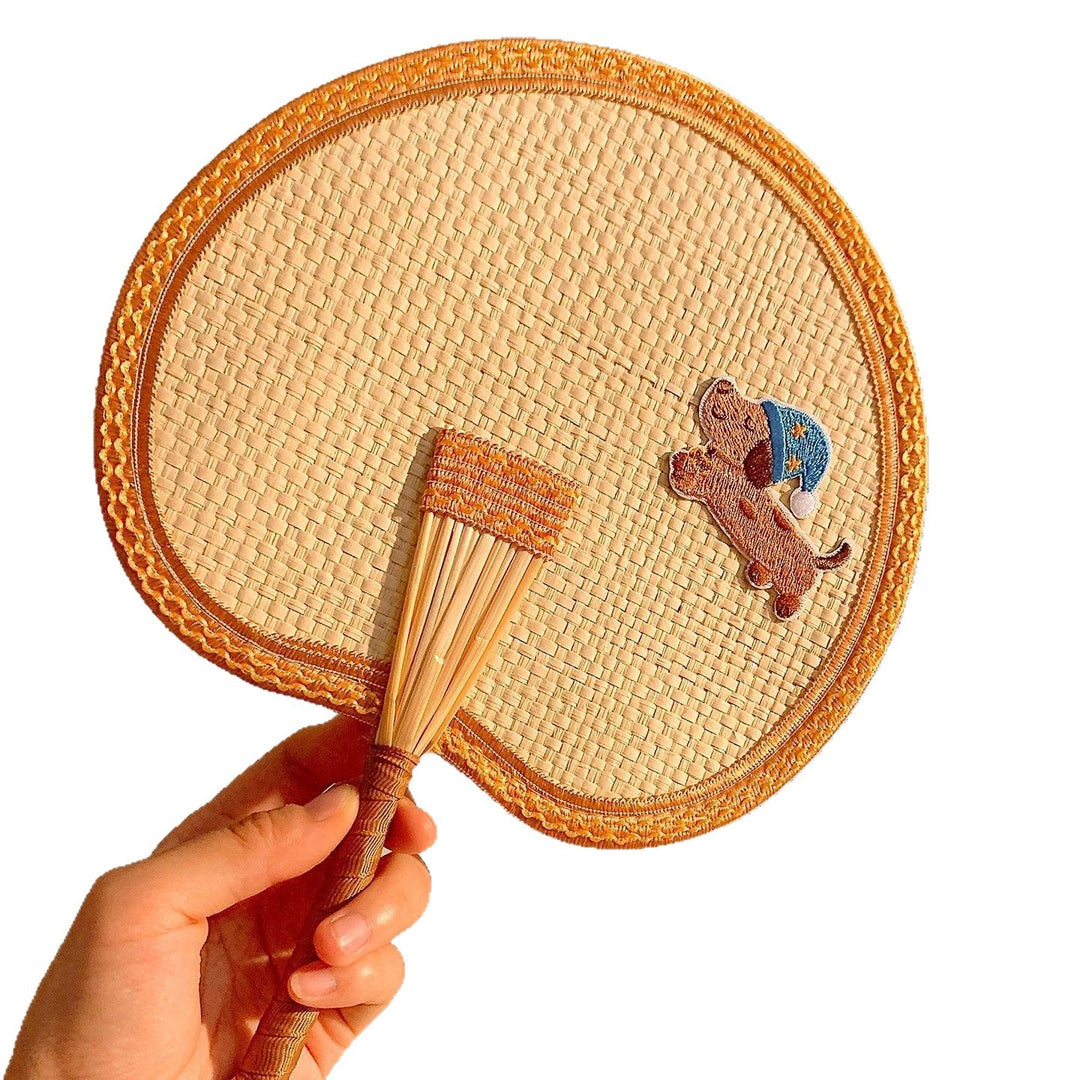 Handcrafted fan with playful dog motif Bowlift