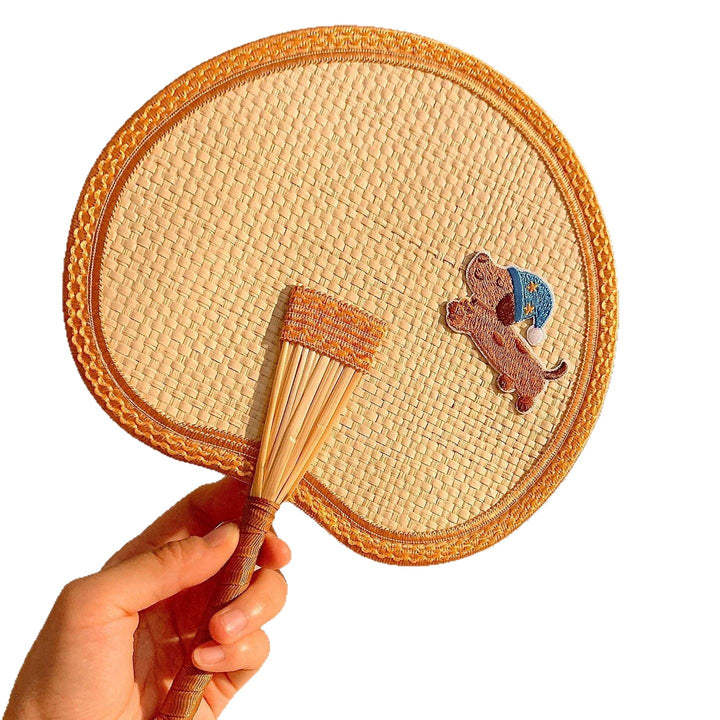 Handcrafted fan with playful dog motif Bowlift