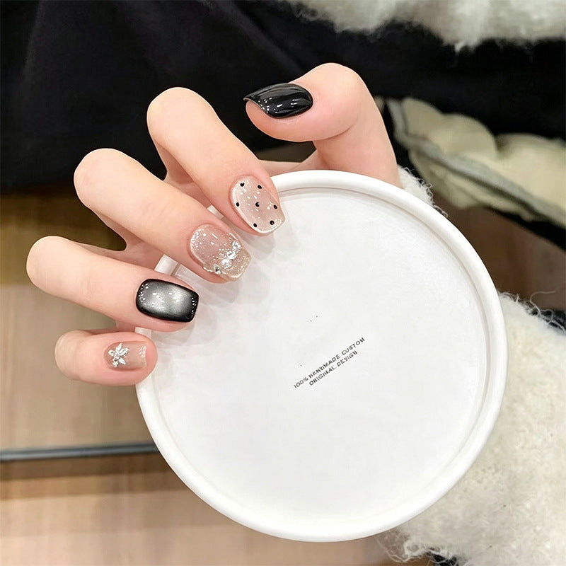 Artificial nail set with sparkling glitter accents Bowlift