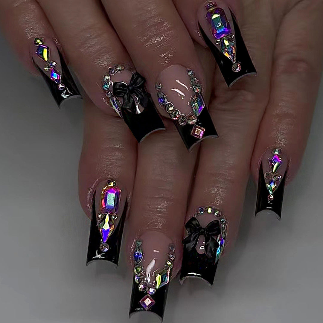 Glamorous artificial nail set with sparkling rhinestone and bow decorations Bowlift