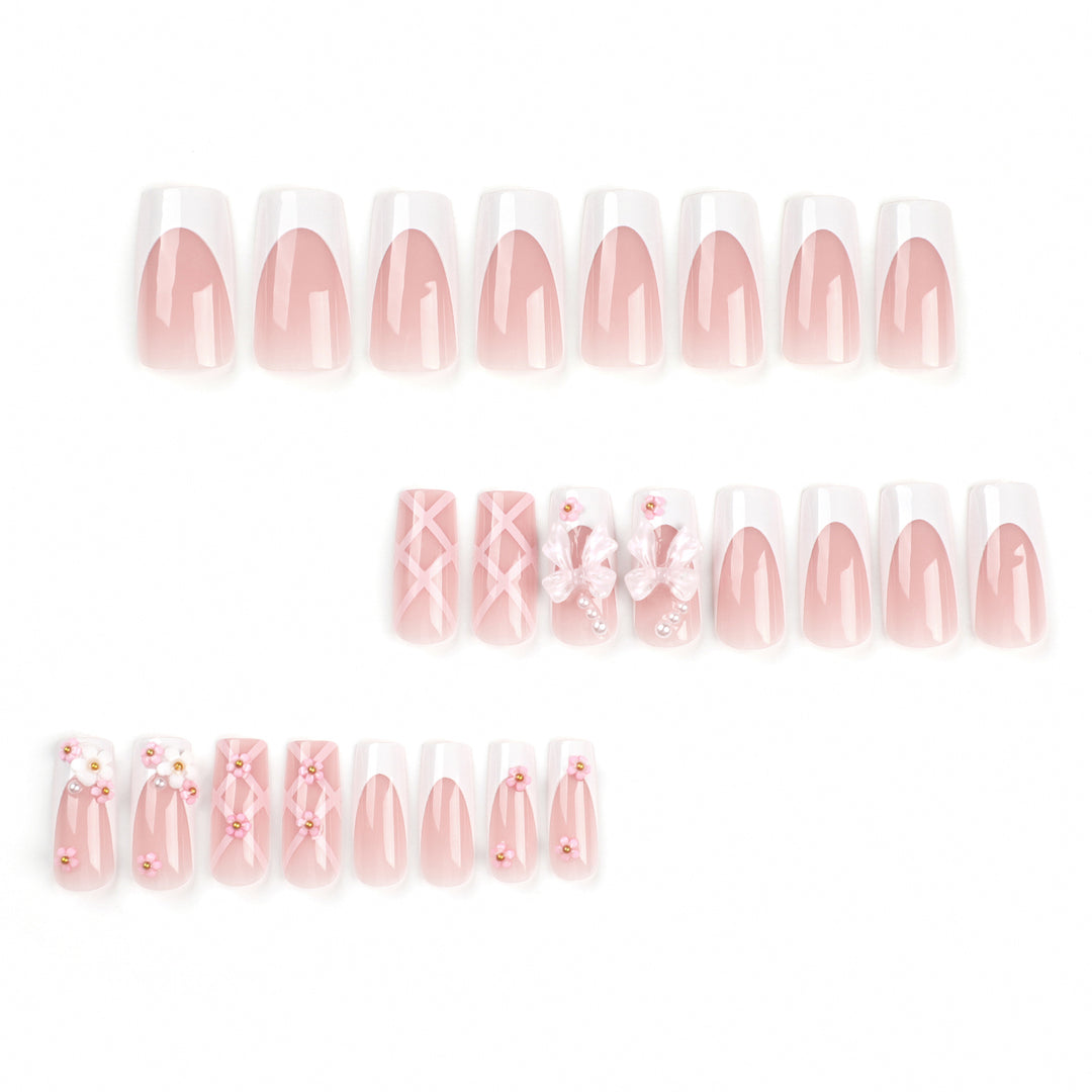 Artificial nail extensions with floral accents Bowlift