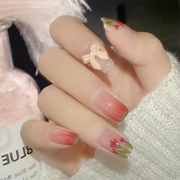Glamorous artificial nails with heart and glitter details Bowlift