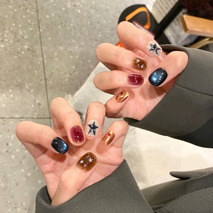 Artificial nails with sparkling star design Bowlift