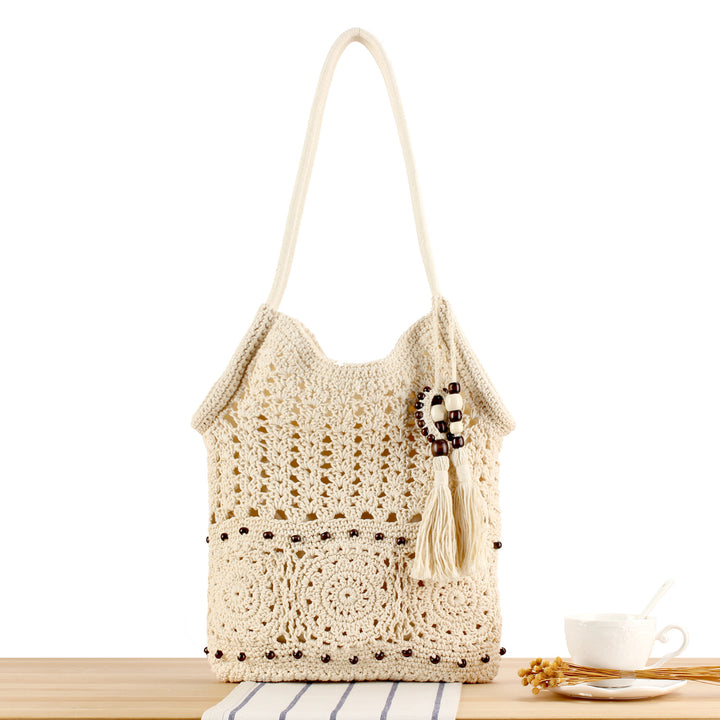 Hand-knotted macrame bag with playful pendant Bowlift