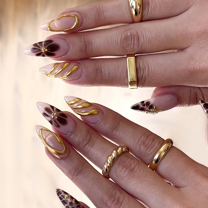 Nail art set with luxurious 3D decorations and golden accents Bowlift