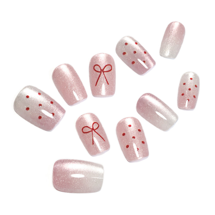 Artificial nail art with cute bow design Bowlift
