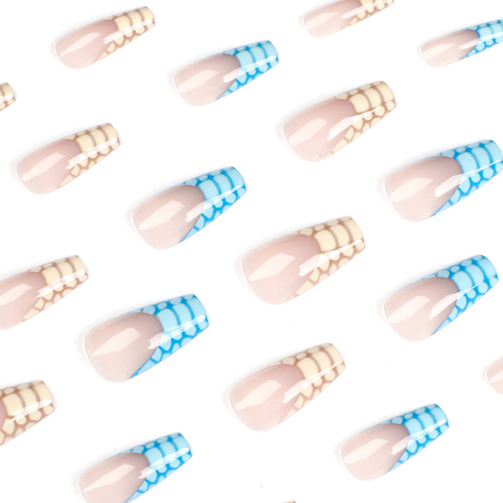 Artificial nail extensions with modern designs and creative color accents Bowlift