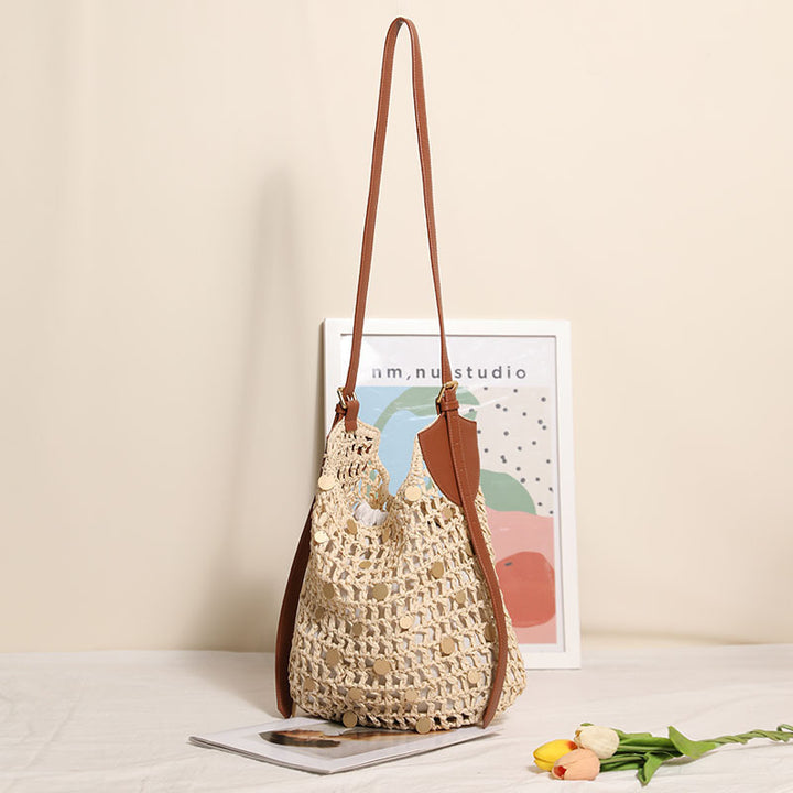 Hand-knotted shoulder bag with metal appliqués Bowlift