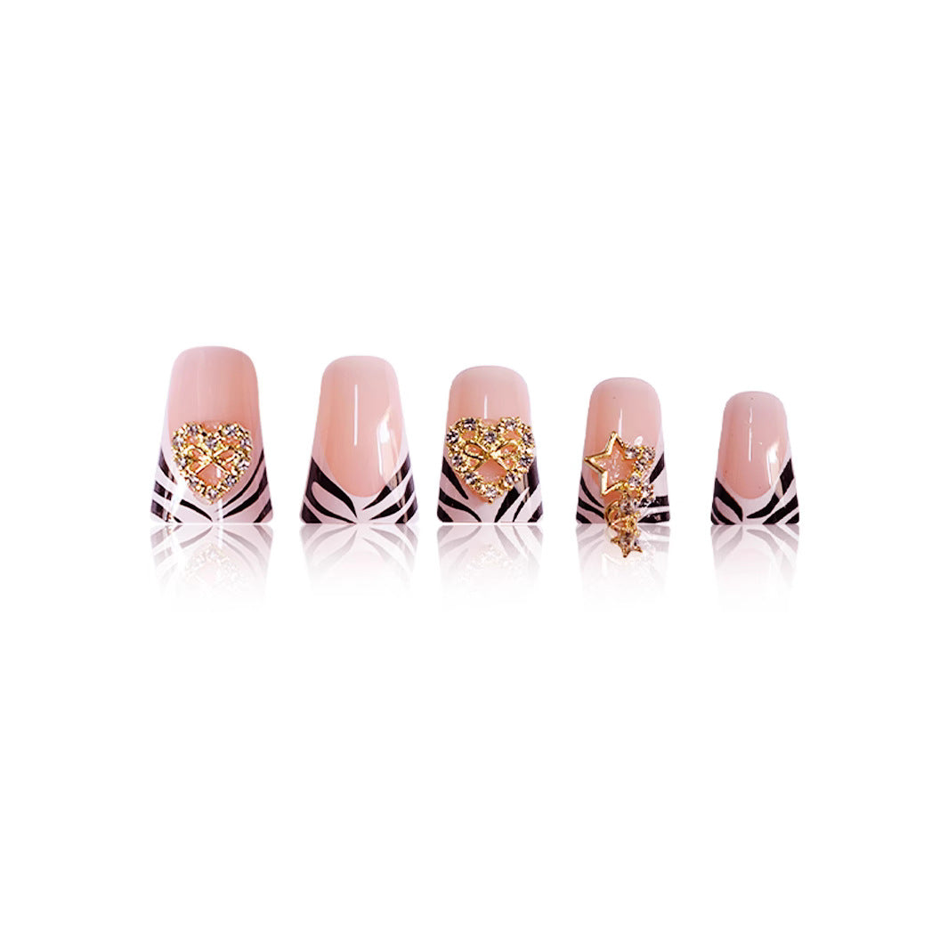 Artistic Zebra-Patterned Nail Enhancements with Gem Accents Bowlift