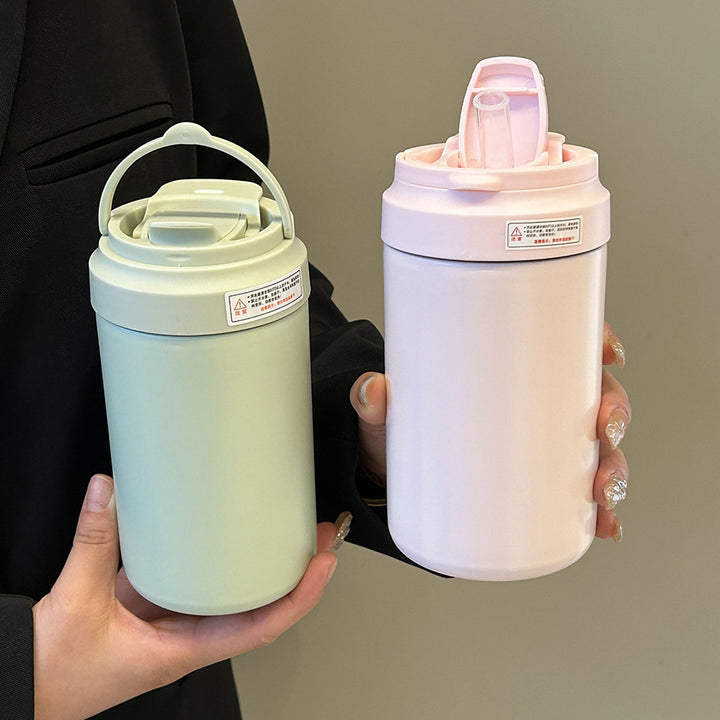Women's insulated mug with practical spill protection and comfortable carrying handle Bowlift