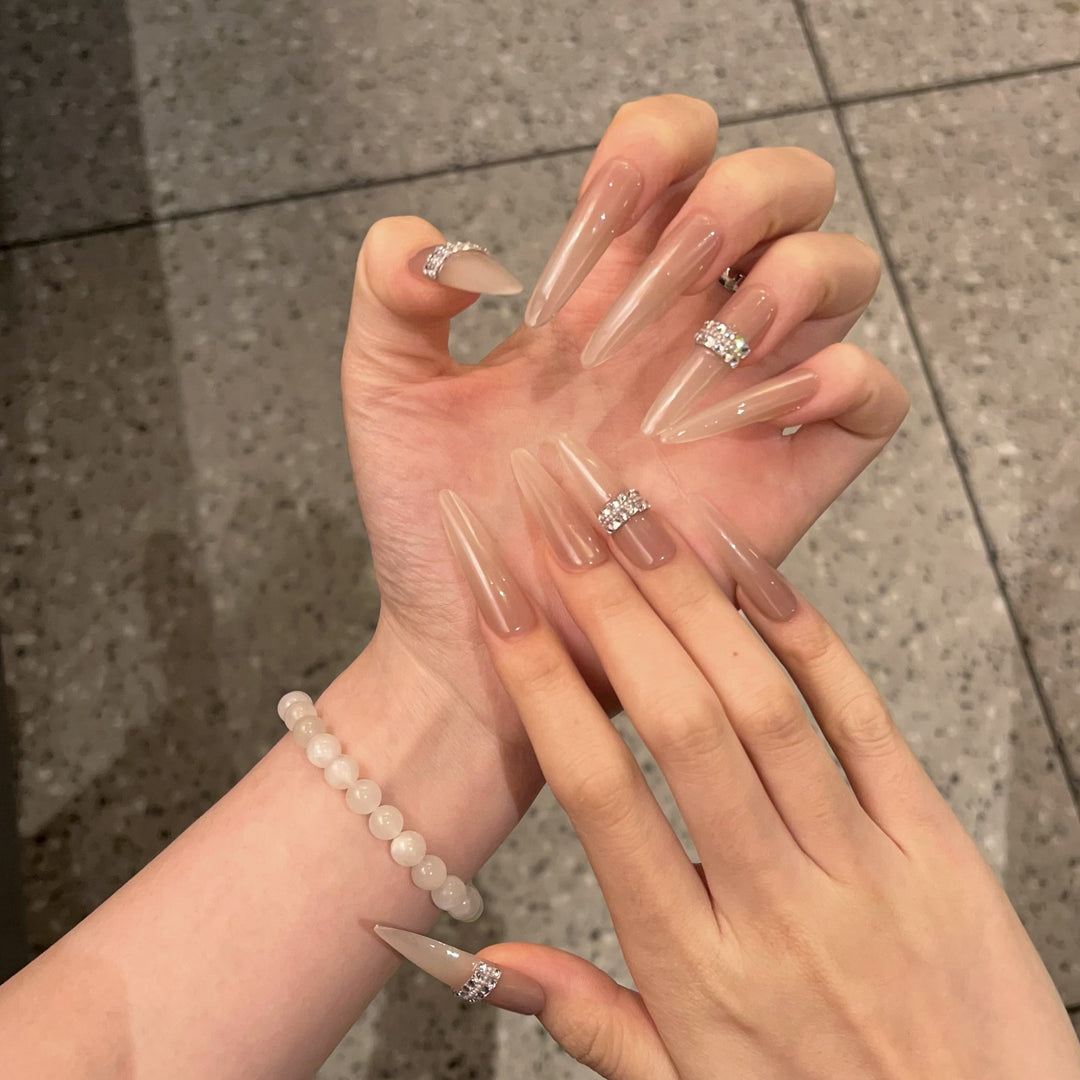 Stiletto Nail Art Tips with Rhinestone Accents Bowlift