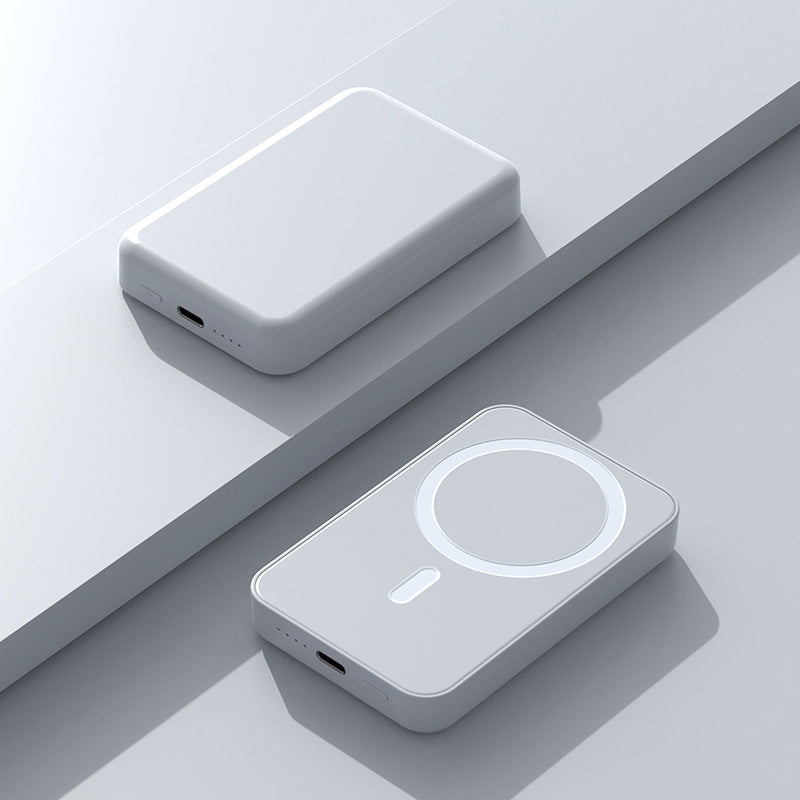 Portable power bank with Qi-compatible magnetic charging and integrated fast charging function Bowlift