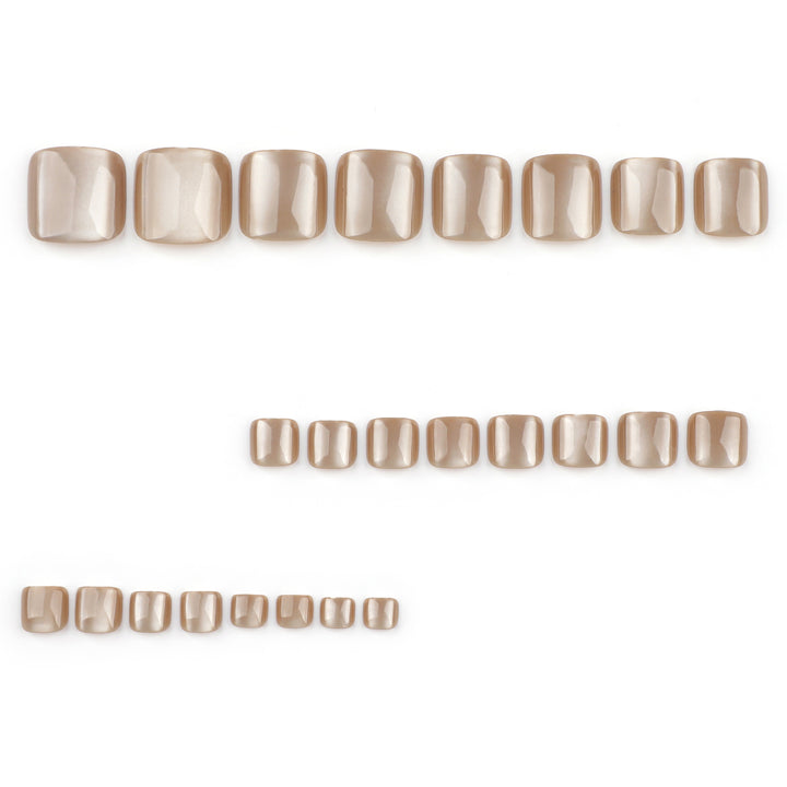 Artful nail art with glitter accents and soft ombre effect Bowlift