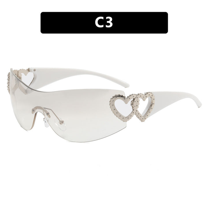 Ladies sporty sunglasses in trendy shield design with heart accents Bowlift