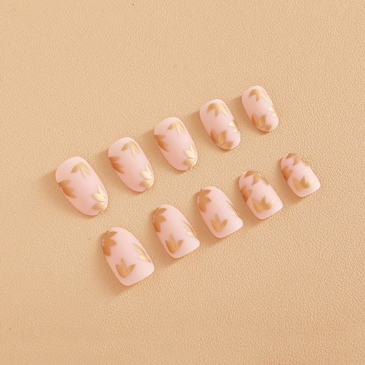 Artificial nail set with elegant gold leaf design Bowlift