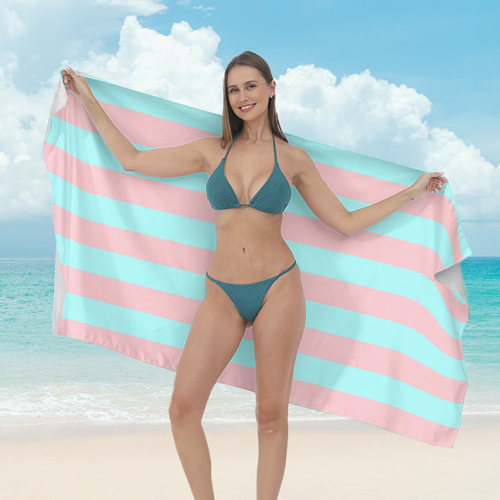 Beach towel with vibrant tropical plant motif Bowlift